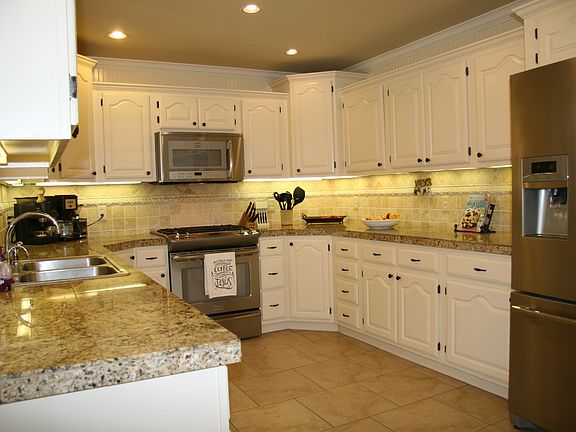 Lots of workspace and storage in kitchen