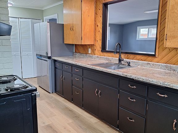 Kitchen with view into 18' x 24' family room