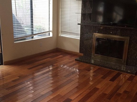 Family Room With Fireplace and TV stand