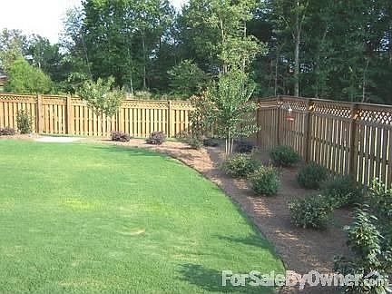 Backyard
						:
						Other plants include laurapedlums, camellias, abellias and hibiscus.
