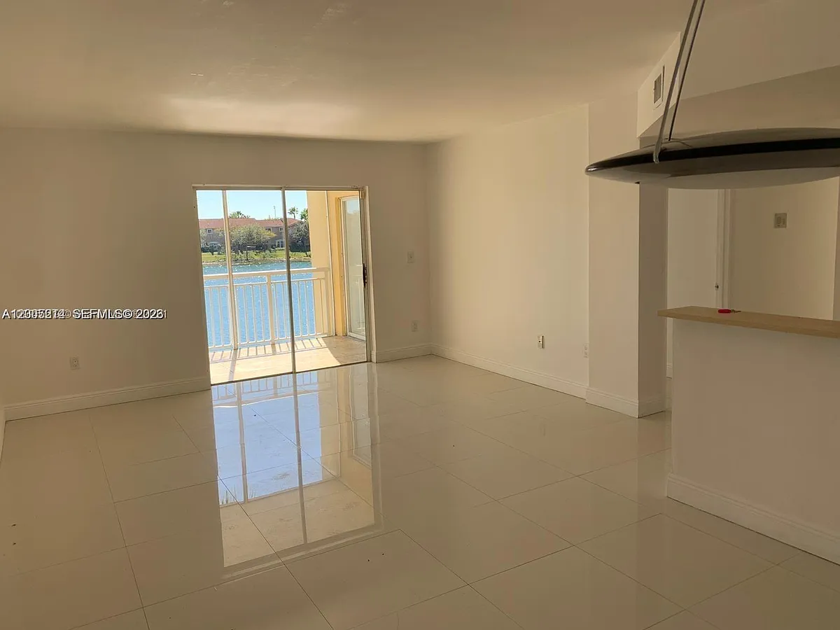 Building Photo - 8590 SW 212th St #210
