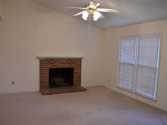 Wood burning fireplace in living room