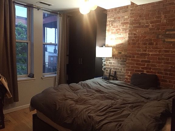 Bedroom w/attached half bathroom and fire escape