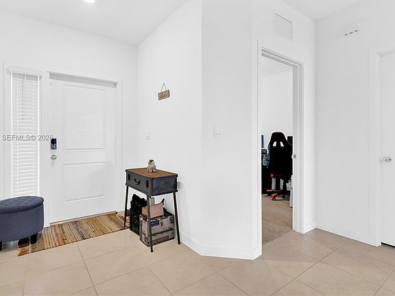 5th image of 117 NE 3rd Ct