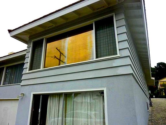 Rear of House/Living Room Window Upper/Family Room Sliders D