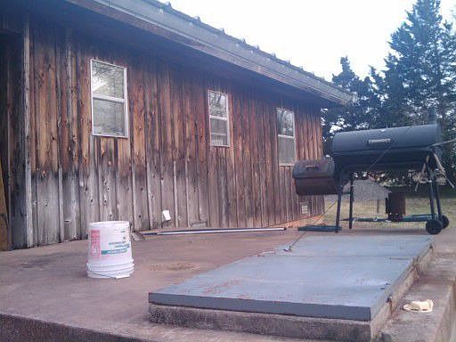 Storm shelter located off the back porch