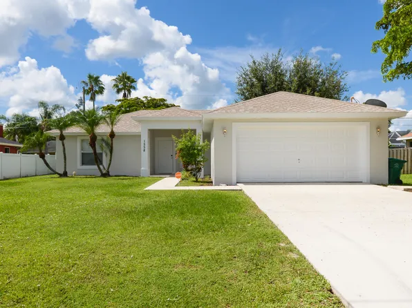 1558 SW Mullinax Avenue, Port St Lucie, FL 34953