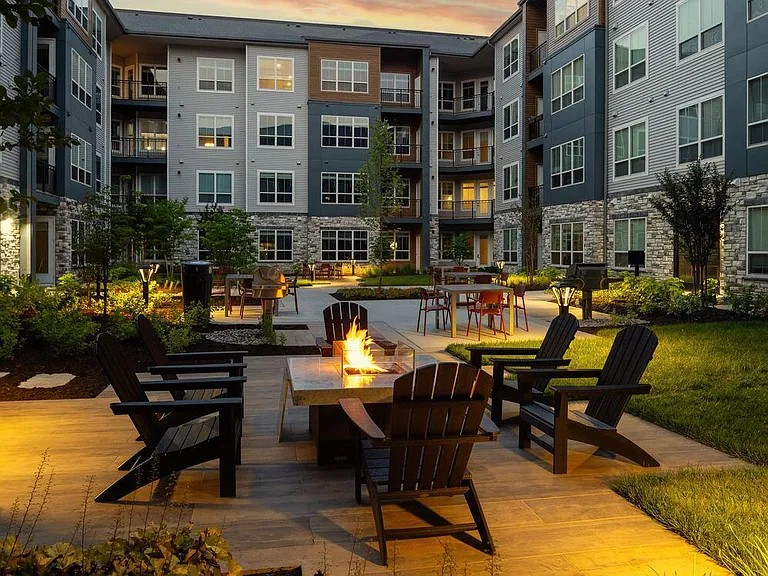 Courtyard with seating and fireplace