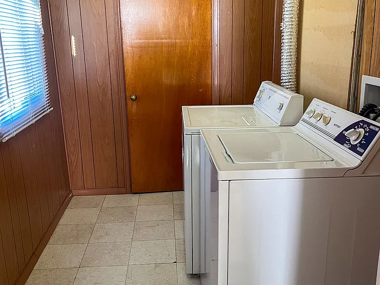Laundry room and storage.