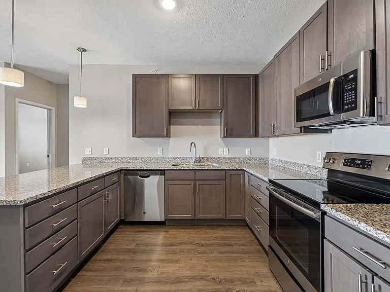 Elevate every recipe in a chef-inspired kitchen where expansive countertops, abundant cabinetry, and contemporary finishes come together with effortless style.
