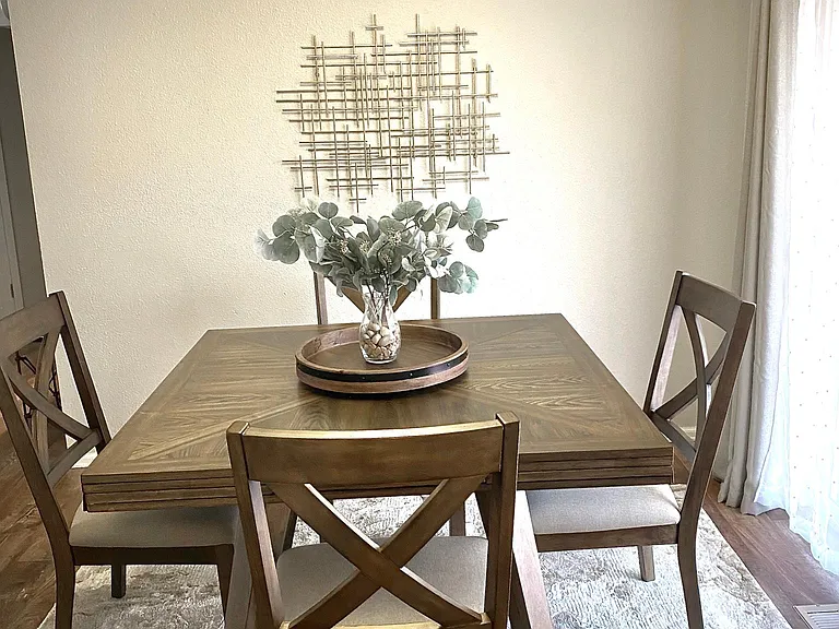 Dining area with sliding doors to backyard