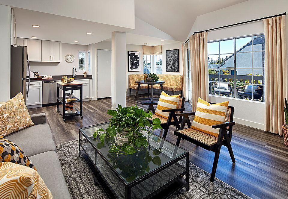 Newly remodeled with wood-style flooring throughout dining and living areas