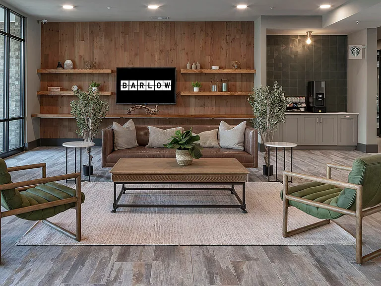 Experience a welcoming and stylish lounge designed for relaxation and social gatherings.