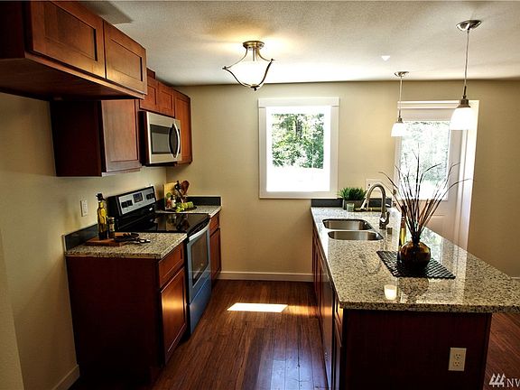 3rd image of 703 Ohop Creek Dr N