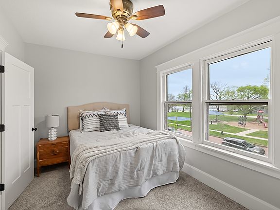Two bedrooms upstairs with queen size beds, smart TV, closet and dresser.