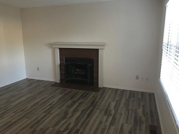 L.R. wood burning fireplace