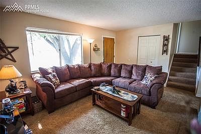 Walk into a nice sized family room with lots of natural light.