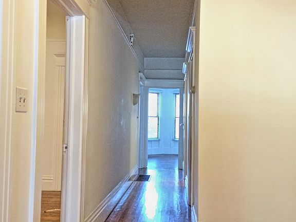 Hardwood floors throughout, extra large foyer for bookcases,