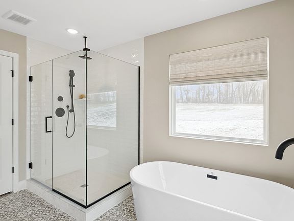 Primary bath with glass-shower enclosure