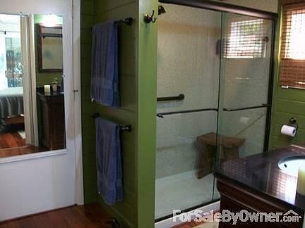 Full Bath-Custom Closets
						:
						Large open shower with Teak seat.
Furniture style cabinets with granite top.