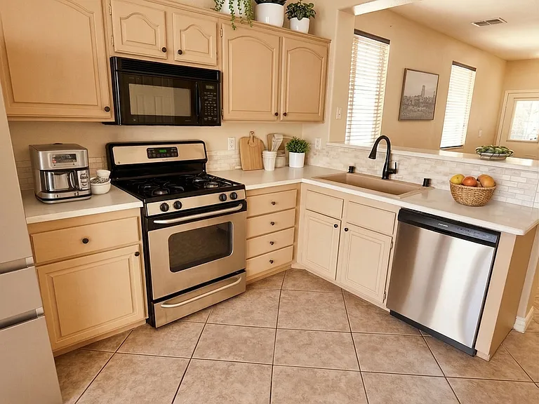 Brand New Upscale Refrigerator and Dishwasher. Quartz Countertop and Plenty of Cupboard Space! Brand New Washer and Dryer.(Staged)