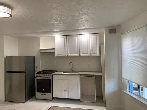 Kitchen which opens to the living room. All new stainless steel appliances. Dishwasher will be installed on 9/13