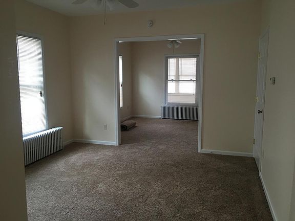 New carpet in living room and den.