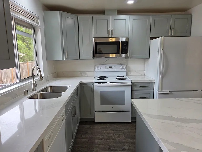 Lovely new kitchen with new cabinets and countertops
