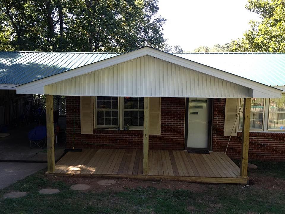 New porch and metal roof. 