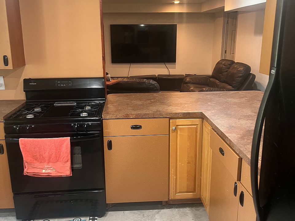 Open from kitchen over the snack bar into the living room.