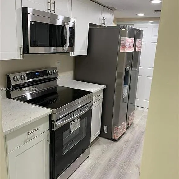 7911 NW 75th Ave — Photo 1