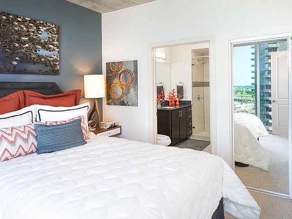 Bedrooms with exposed concrete ceilings