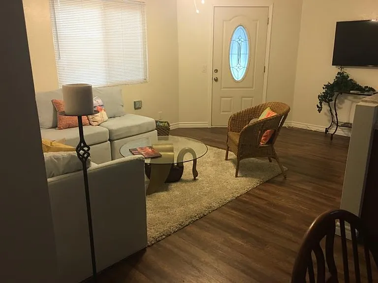 Living room - the apartment is unfurnished but the photos have past owner's furniture.