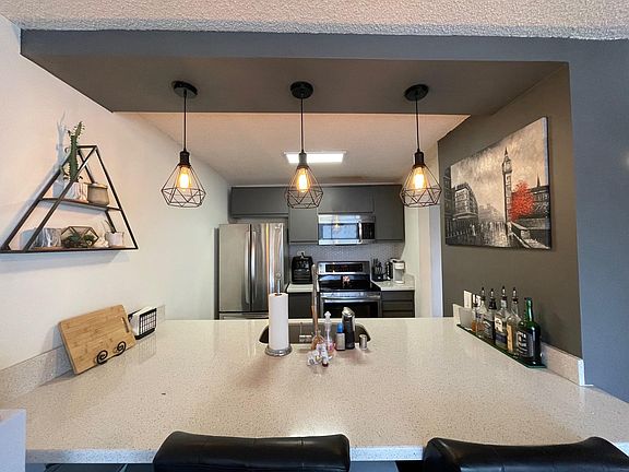 Eat at counter-top facing kitchen.