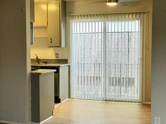 Separate Dining Room w/ Large Sliding Doors to Private Balcony ~in the upstairs unit.