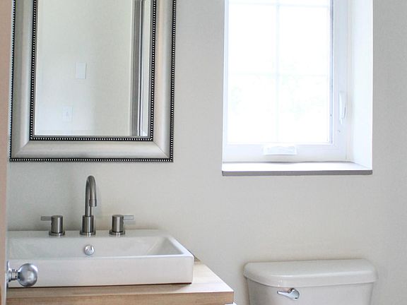 Bathroom has a full tub/shower.
