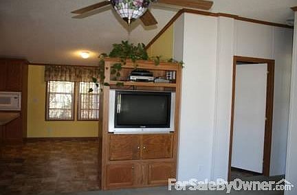 Entertainment Center
						:
						Closer view of entertainment center. Opens into spacious dining area.