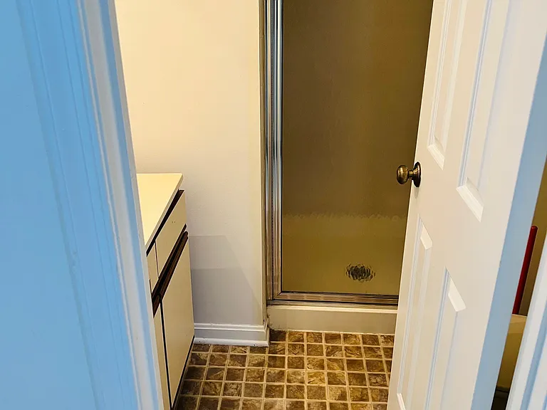 Full bathroom with shower in the basement