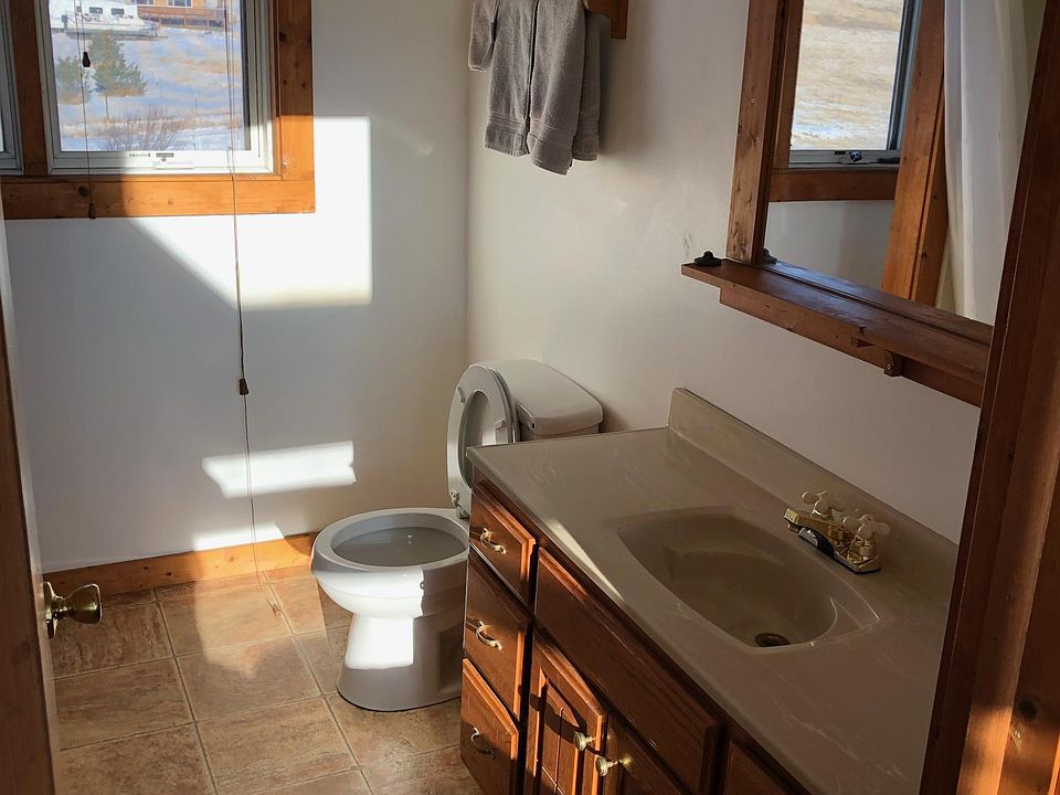 Bath with tub and shower.