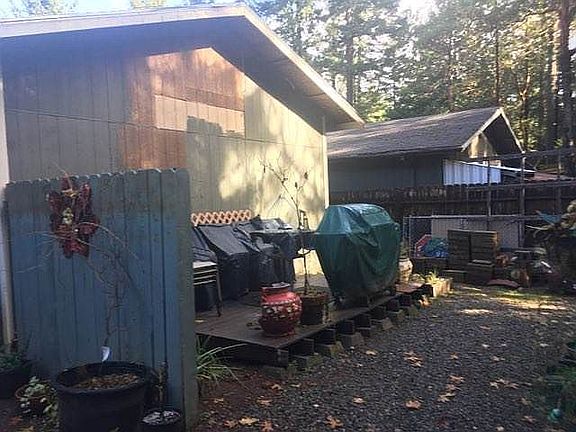 Behind shop/garage