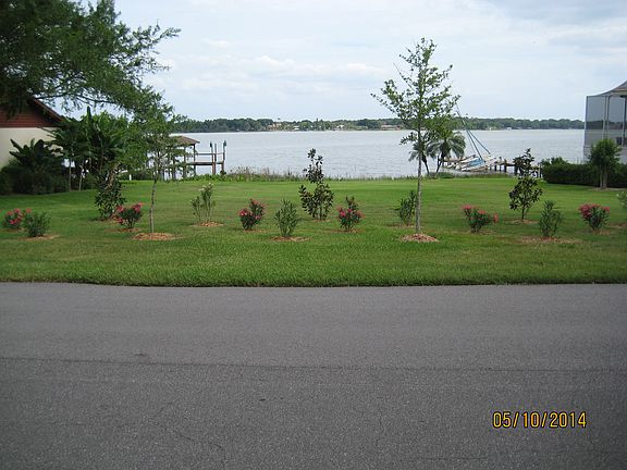 asphalt street, lot and lake