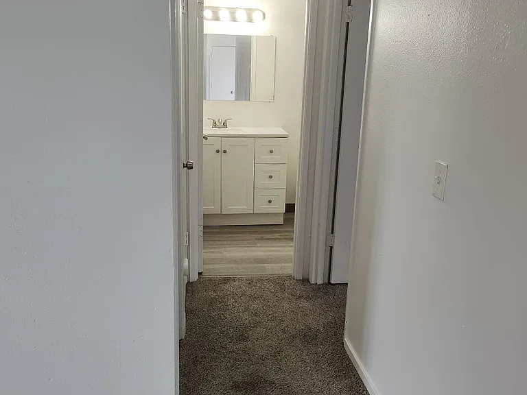 Hallway to bedrooms and bath