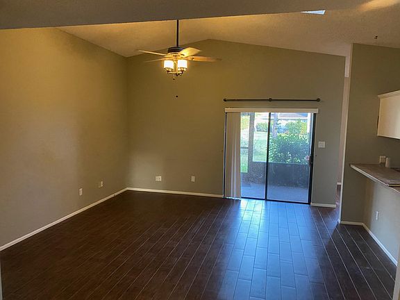 Large living area opens onto private lanai.
