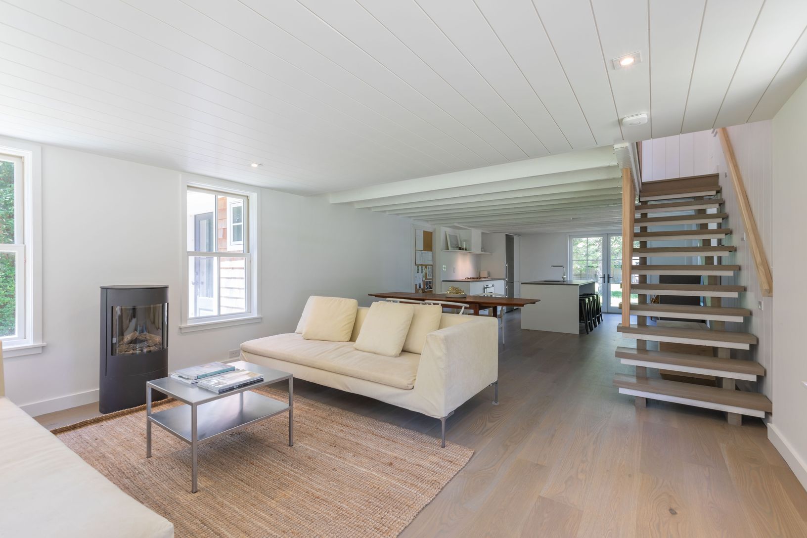  Right side Open Plan LR with fireplace