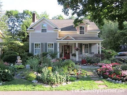 curb appeal, sun-filled and spacious