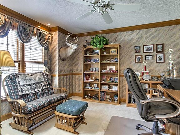 Office w/ french doors near the front of the home.
