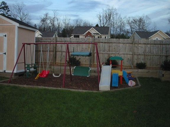 Swing set area and storage building