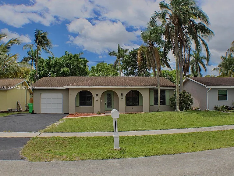 10784 NW 23rd Ct — Photo 1