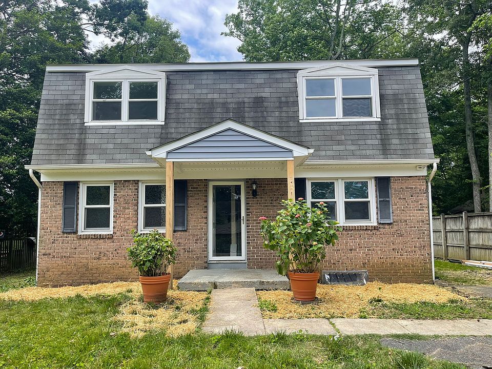 Front of House with overhang roof