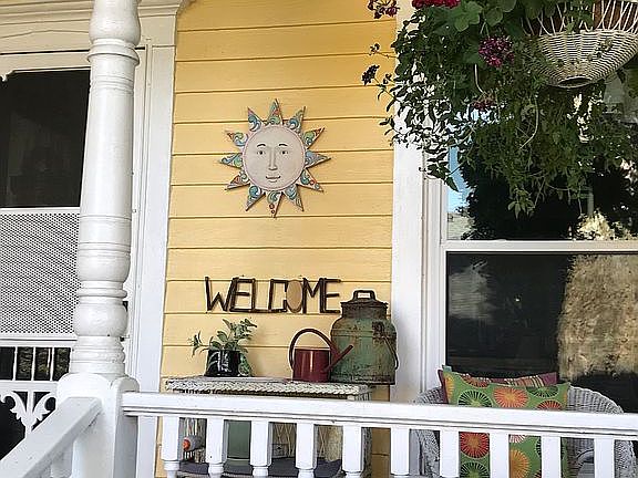 Side porch facing barn 